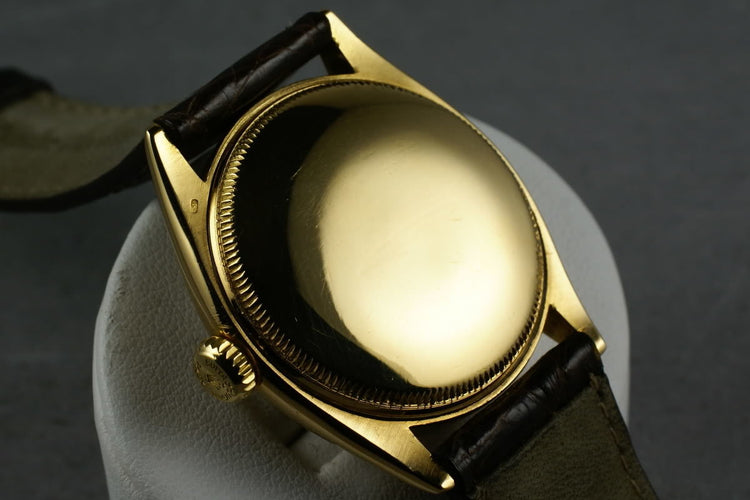 1952 Rolex 18K Oyster Perpetual 6085 with red “officially” on the dial