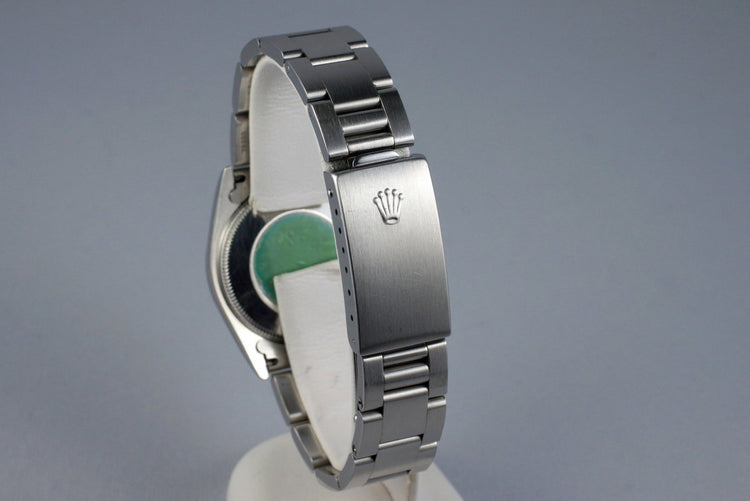 1995 Rolex MidSize Oyster Perpetual 67480 Silver Dial