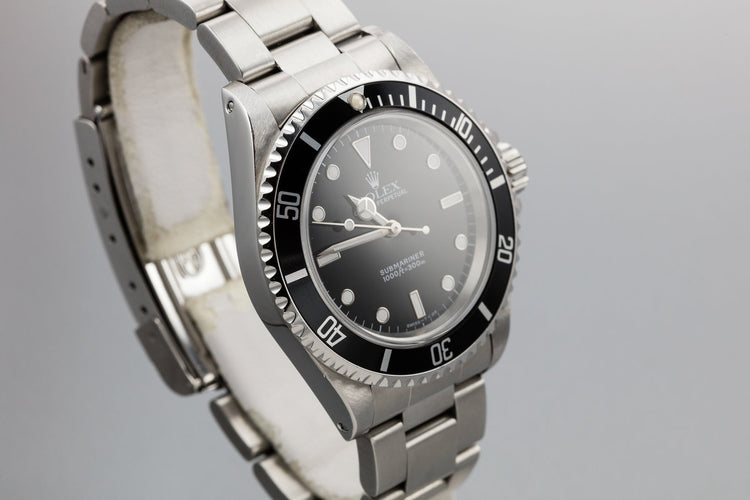 1995 Rolex Submariner 14060 with Box and papers