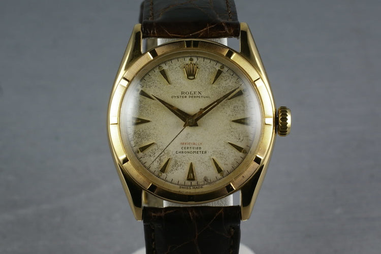 1952 Rolex 18K Oyster Perpetual 6085 with red “officially” on the dial