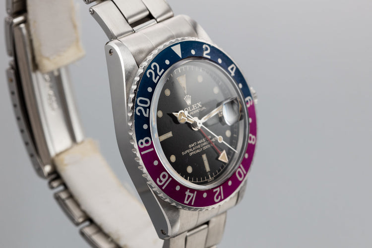 1960 Rolex GMT-Master 1675 with Pointed Crown Guard Case, Gilt Exclamation Dial, and Fuchsia Bezel Insert with Papers