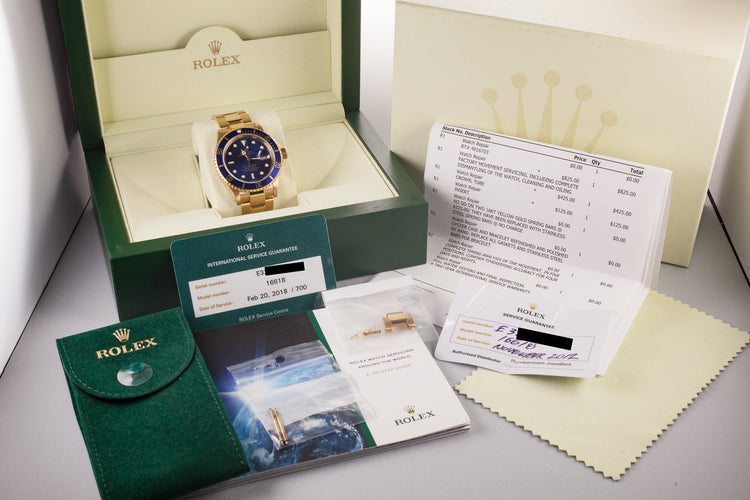 1990 Rolex 18K Submariner 16618 Blue Dial with Service Papers