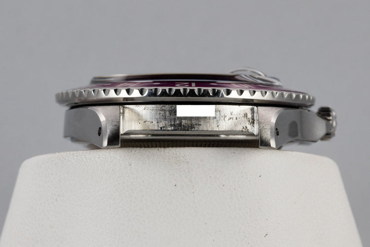 1960 Rolex GMT-Master 1675 with Pointed Crown Guard Case, Gilt Exclamation Dial, and Fuchsia Bezel Insert with Papers