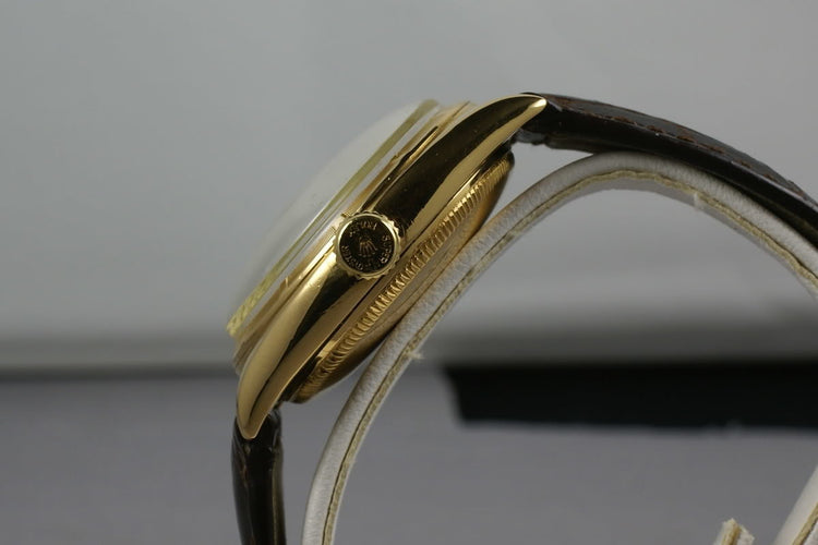 1952 Rolex 18K Oyster Perpetual 6085 with red “officially” on the dial