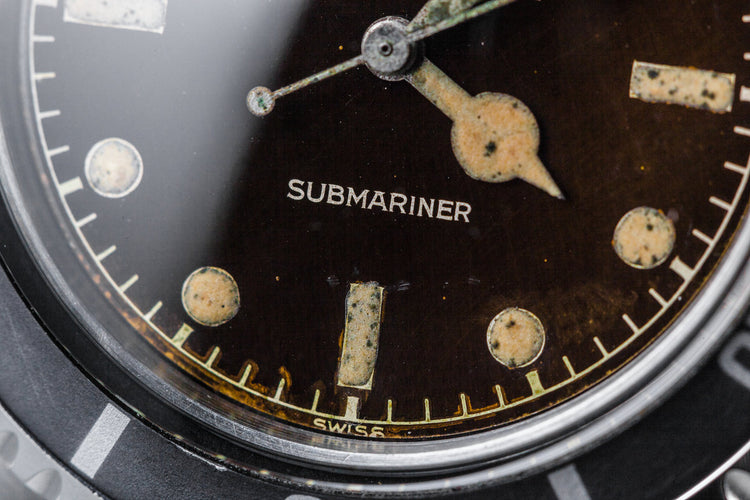 1959 Rolex Submariner 5512 with Tropical Gilt Chapter Ring Dial, Red Triangle Bezel, and Big Logo Stretch Bracelet