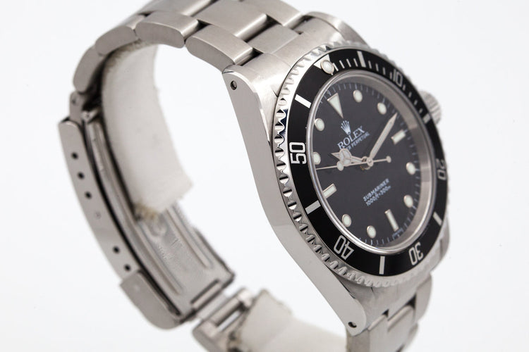 1999 Rolex Submariner 14060 SWISS only dial