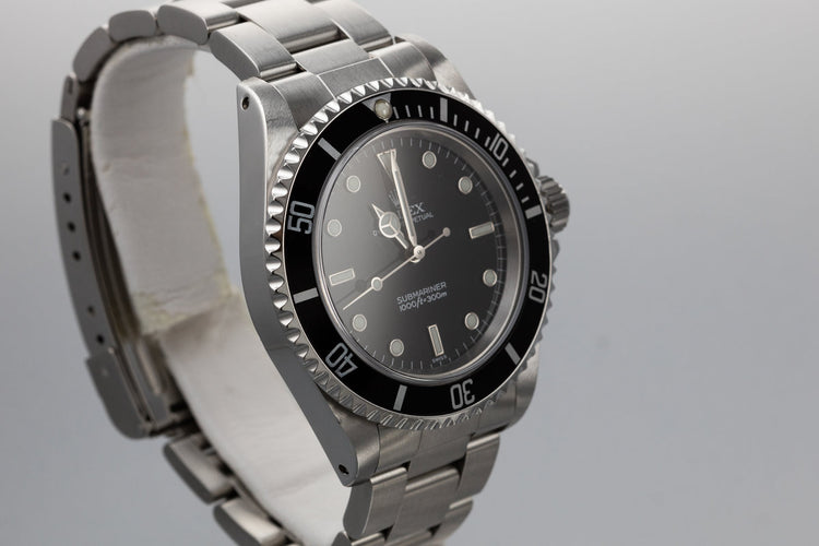 1999 Rolex Submariner 14060 with SWISS Only Dial