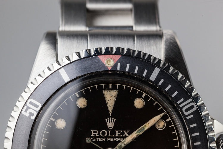 1959 Rolex Submariner 5512 with Tropical Gilt Chapter Ring Dial, Red Triangle Bezel, and Big Logo Stretch Bracelet