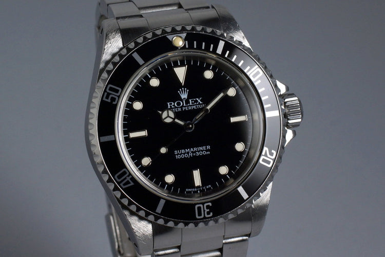 1996 Rolex Submariner 14060 with Box and Papers