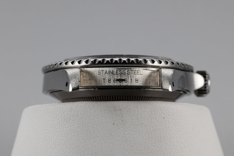 1995 Rolex Submariner 14060 with Faded bezel insert.