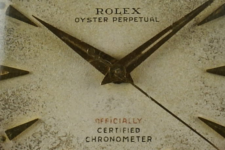 1952 Rolex 18K Oyster Perpetual 6085 with red “officially” on the dial