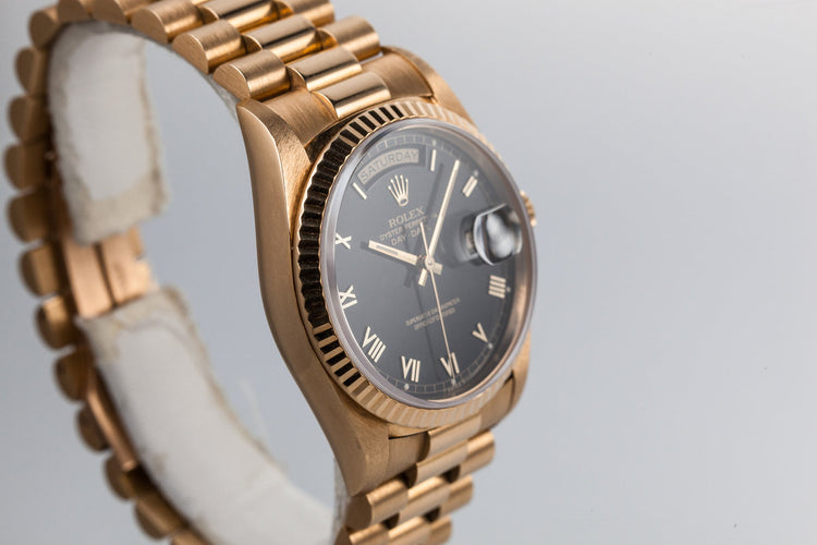 1991 Rolex 18k Day-Date 18238 Black Roman Dial