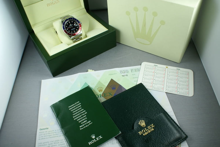 Rolex GMT Ref: 16710 F serial with Box and Papers