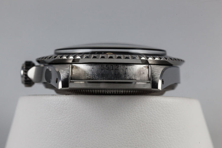 1959 Rolex Submariner 5512 with Tropical Gilt Chapter Ring Dial, Red Triangle Bezel, and Big Logo Stretch Bracelet