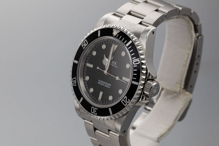 1999 Rolex Submariner 14060 with SWISS Only Dial