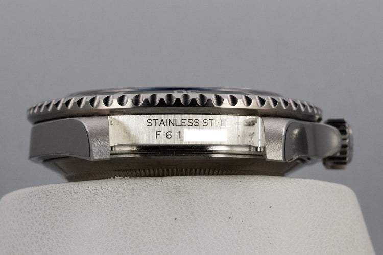 Mint 2004 Rolex Anniversary Submariner Green 16610 with Box and Papers