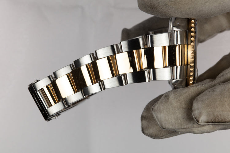 1995 Rolex Two-Tone Submariner 16613 with Champagne Serti Dial