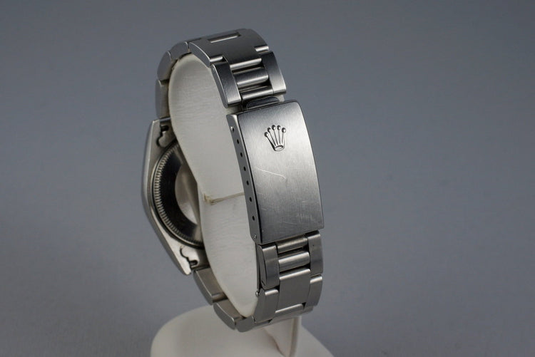 1999 Rolex MidSize Oyster Perpetual 77014 Silver Dial