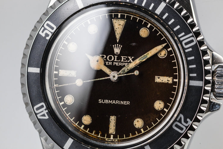 1959 Rolex Submariner 5512 with Tropical Gilt Chapter Ring Dial, Red Triangle Bezel, and Big Logo Stretch Bracelet