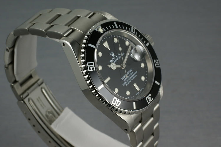 Rolex Submariner 16610 with box and papers K serial