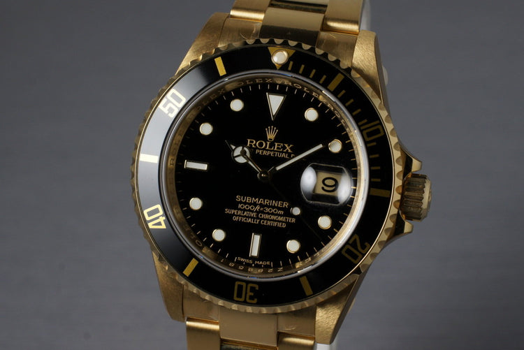 2006 Rolex YG Submariner 16618 with Box and Papers MINT with stickers