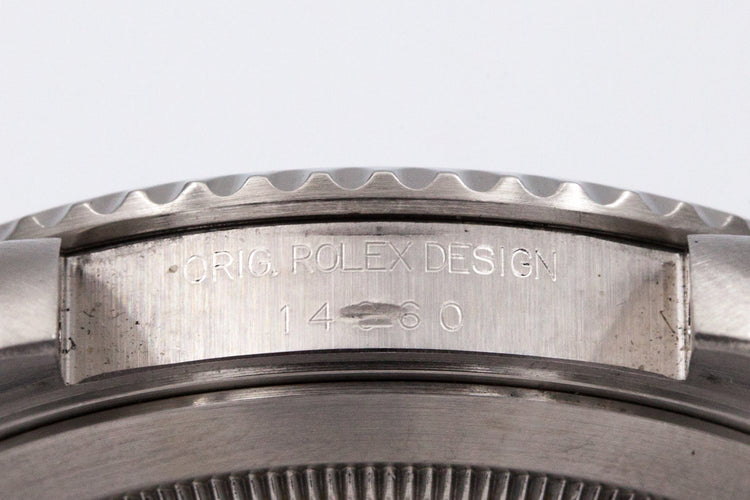 1999 Rolex Submariner 14060 with uncommon SWISS only dial