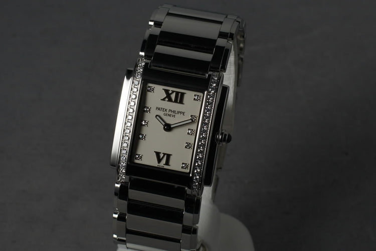 Patek Philippe Ladies 24 with Diamonds and Box and Papers