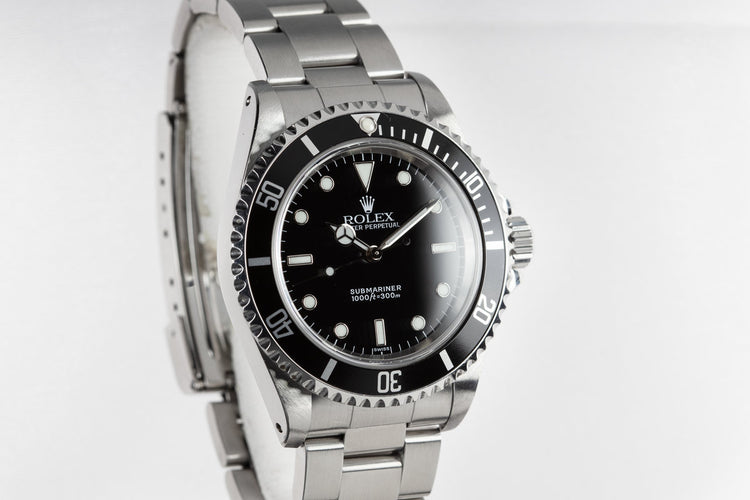 1999 Rolex Submariner 14060 with SWISS Only Dial