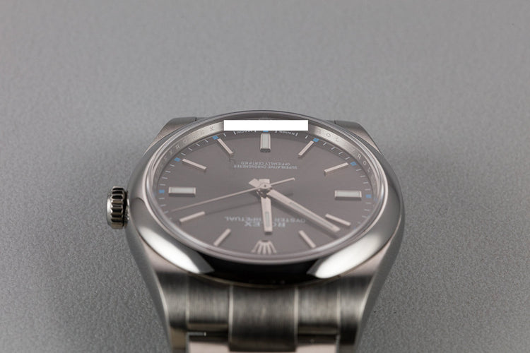 Rolex Oyster Perpetual 114300 Dark Rhodium Dial