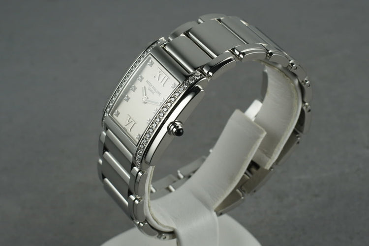 Patek Philippe Ladies 24 with Diamonds and Box and Papers