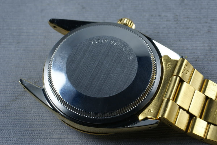 Rolex Date 1550 Gold cap ... box and papers