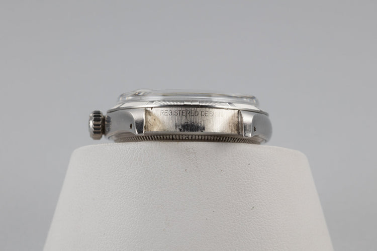 1967 Rolex Date 1500 Gilt Dial with Deep Ruby Tropical Patina