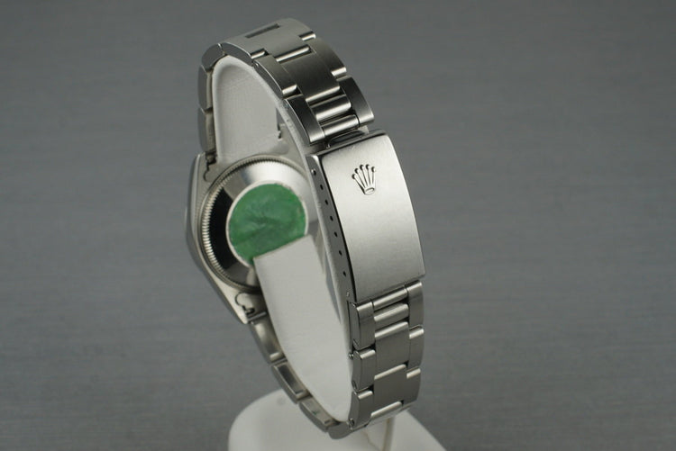 1997 Rolex MidSize Oyster Perpetual 67480 with White Roman Dial