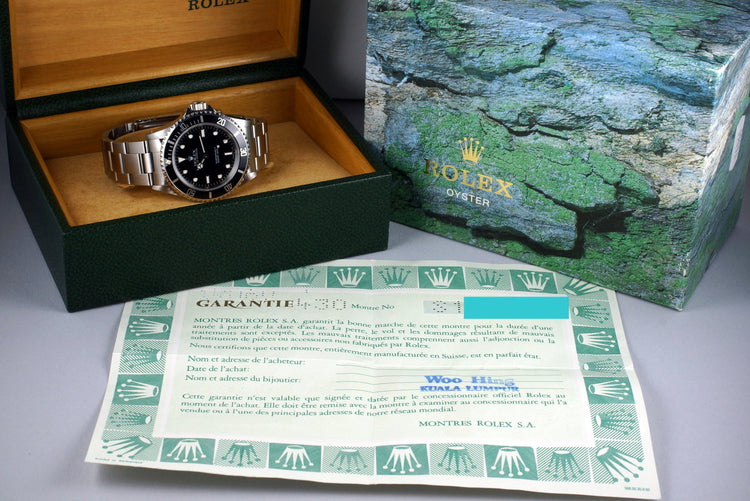 1994 Rolex Submariner 14060 with Box and Papers