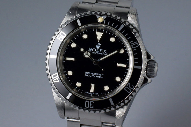 1996 Rolex Submariner 14060 with Box and Papers