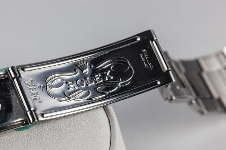 1959 Rolex Submariner 5512 with Tropical Gilt Chapter Ring Dial, Red Triangle Bezel, and Big Logo Stretch Bracelet