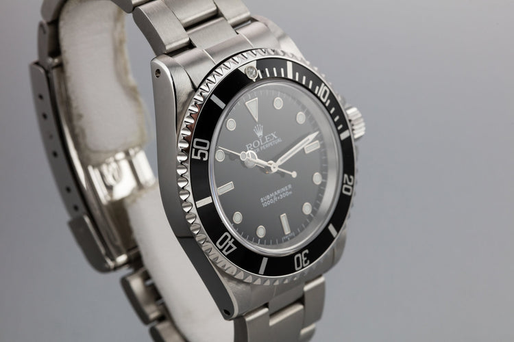 1999 Rolex Submariner 14060 with SWISS Only Dial