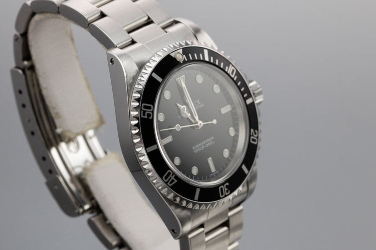 1999 Rolex Submariner 14060 with SWISS Only Dial