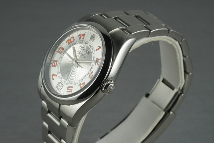 2006 Rolex Air-King M serial 114200 Silver Concentric and Orange Dial