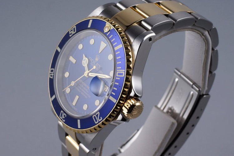 1999 Rolex Two Tone Blue Submariner 16613 with Box and Papers
