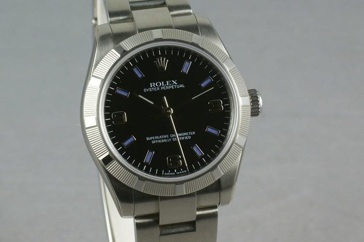 Rolex Midsize Oyster Black Arabic Numbers and Blue Markers 177210