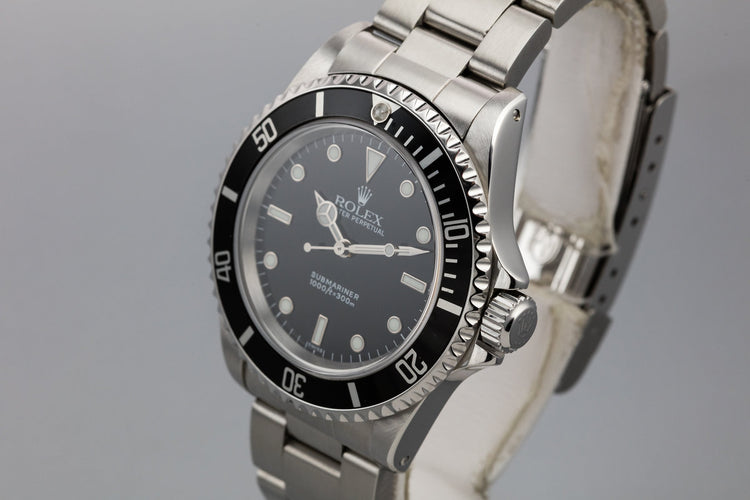 1999 Rolex Submariner 14060 with SWISS Only Dial