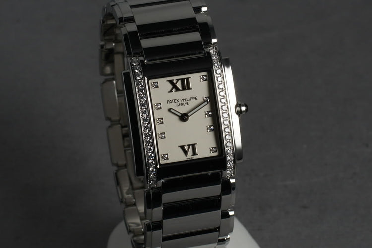 Patek Philippe Ladies 24 with Diamonds and Box and Papers