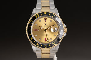 1991 Rolex 16713 18k/St GMT Master II Champagne Ruby & Diamond Serti Dial