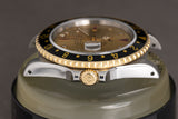 1991 Rolex 16713 18k/St GMT Master II Champagne Ruby & Diamond Serti Dial