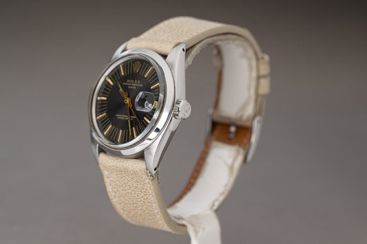 1971 Rolex Date Model 1500 with Gray Dial, Gilt Hands, Gilt Baton Markers on Strap with Service Papers