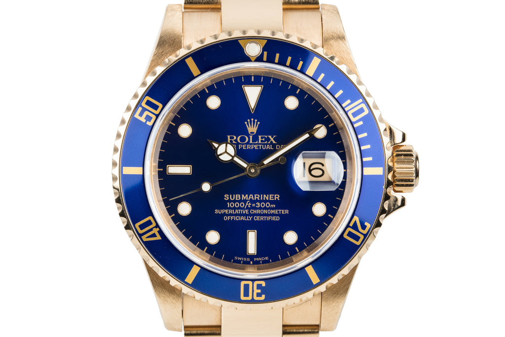 1999 Rolex 18K YG Submariner Blue Dial with Box and Papers