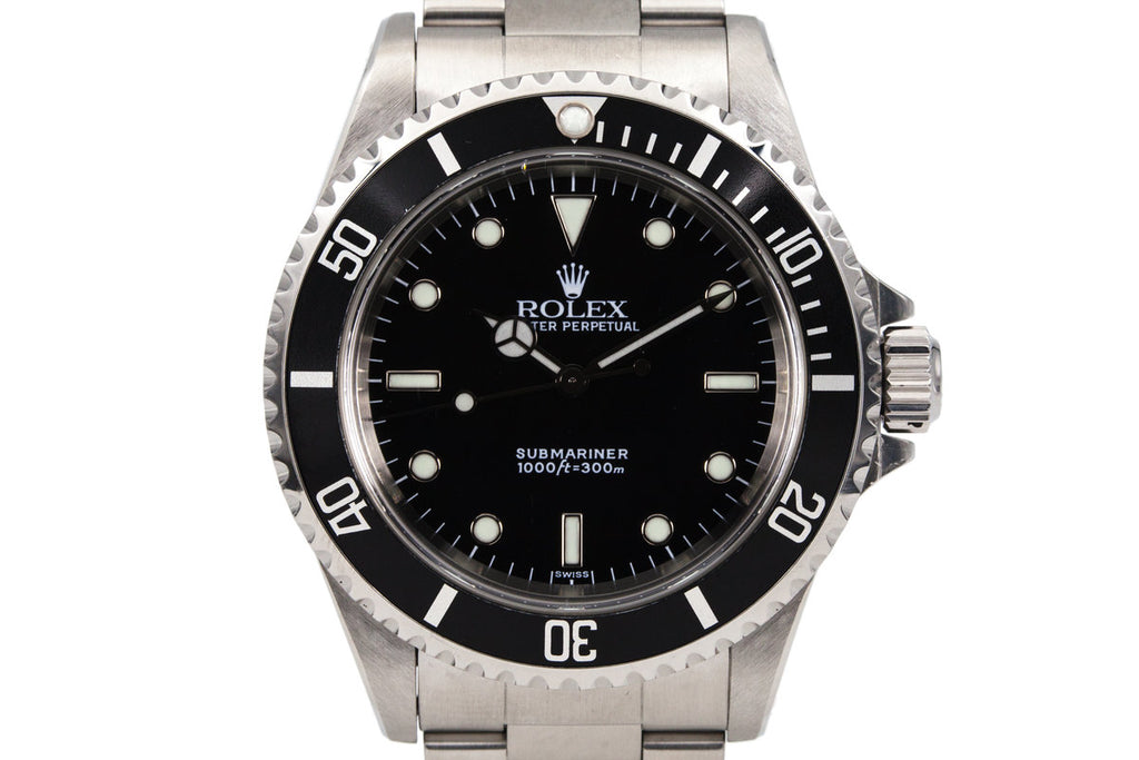 1999 Rolex Submariner 14060 SWISS only dial