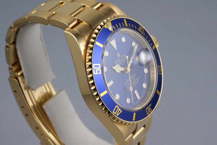 2006 Rolex YG Blue Submariner 16618 with Box and Papers