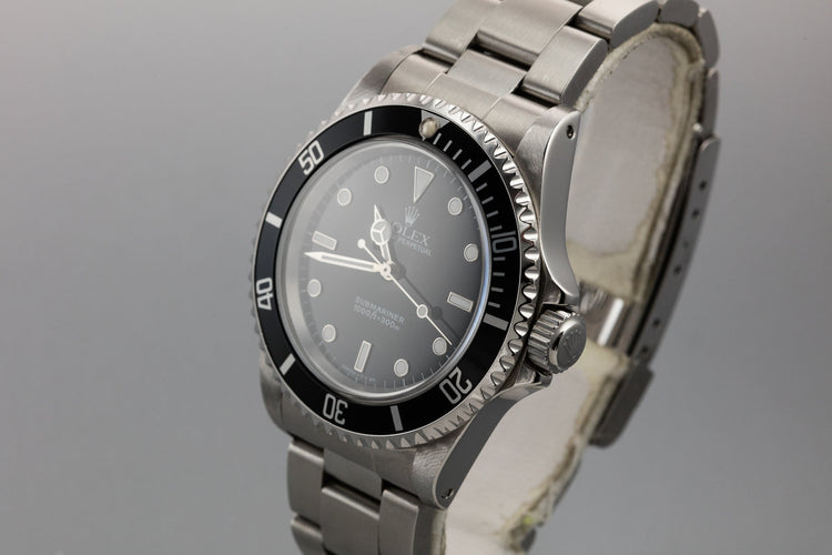 1995 Rolex Submariner 14060 with Box and papers
